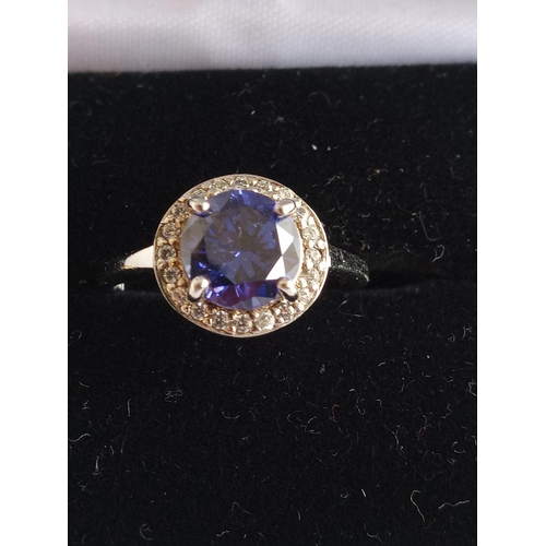 127 - Ladies Silver Ring with Blue & White Stones, Size O