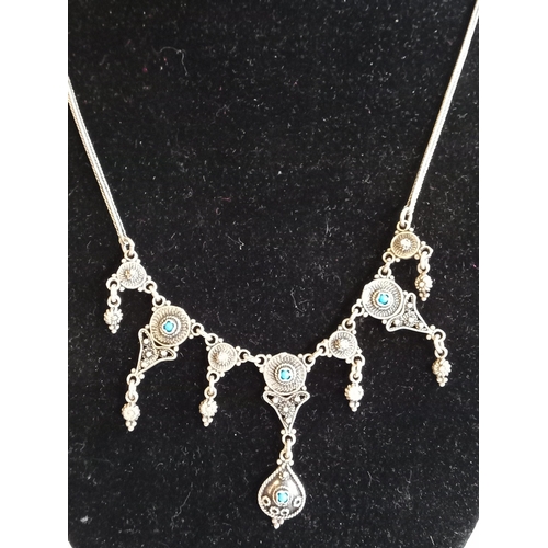 132 - Silver Droplet Necklace with Turquoise Stones