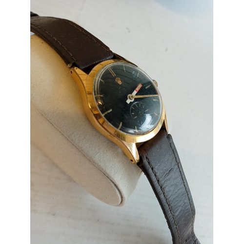 197 - Early Rolex Gents Wrist Watch with Black Dial. Second hand needs replacing but is there under the gl... 