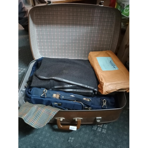 88 - Suit Case Full of Good Quality Cloth