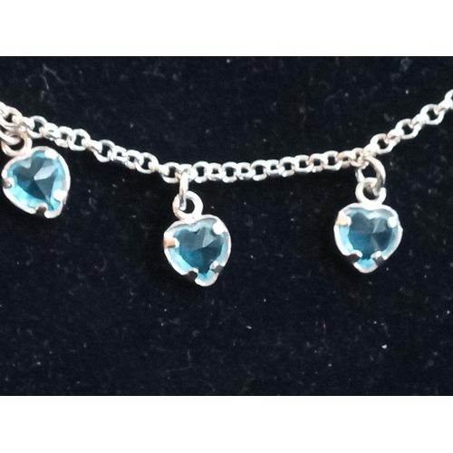 110 - Silver & Topaz Bracelet