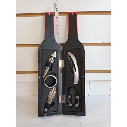 21 - 5 Piece Wine Accessory Kit in the form of a bottle