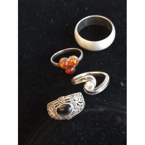 299 - 4 Assorted Silver Rings