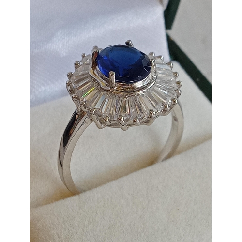 143 - Ladies Silver Ring with Blue & Clear Stones size O