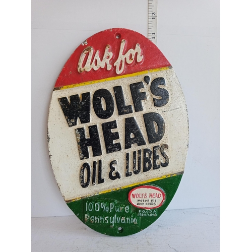 123 - Wolfs Head Oil & Lubes Cast Iron Sign