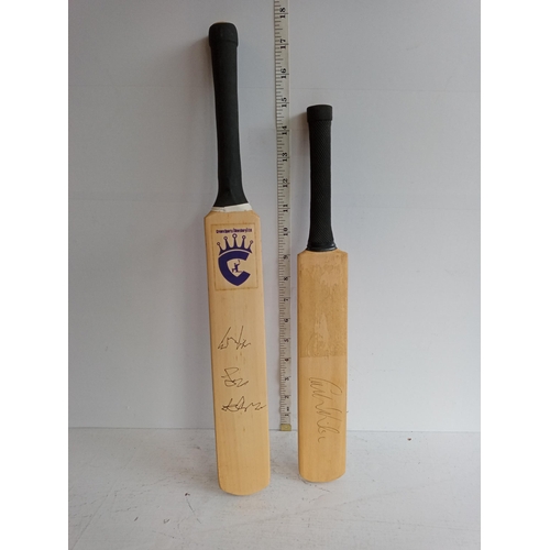 69 - 2 Signed Miniature Cricket Bats