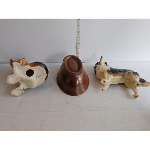 107 - 2 Pottery Dogs & a Jelly Mould