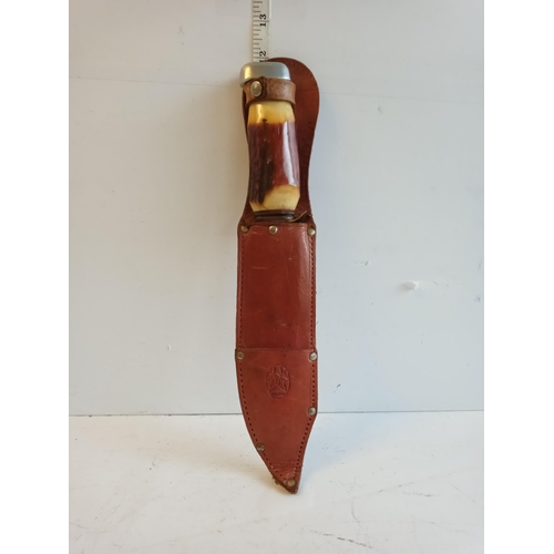 29 - Very Good Quality Horn Handled Bowie Knife in Leather Sheath