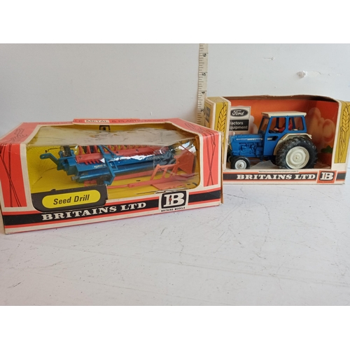 85 - 2 Vintage Britain's farm machines in Original Boxes