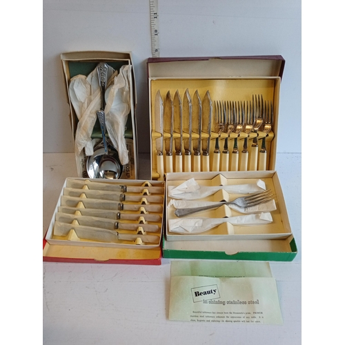 87 - 4 Boxed Vintage Cutlery Sets