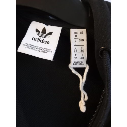 317 - Adidas size 8 Hooded Jacket