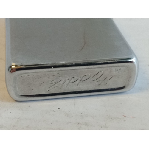 38 - Zippo Lighter intrepid Design