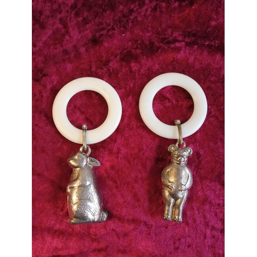 61 - 2 White Metal Child's Rattles