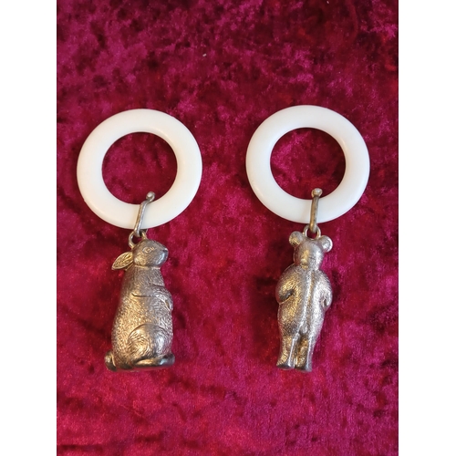 61 - 2 White Metal Child's Rattles