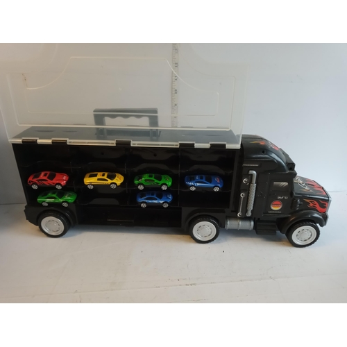 143 - Hot Wheels Truck with Some Cars