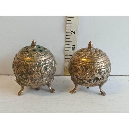 187 - 2 Ornate White Metal Salt & Pepper Pots