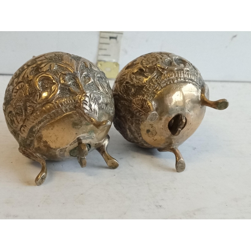 187 - 2 Ornate White Metal Salt & Pepper Pots