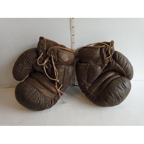 202 - Pair of Antique Straw Filled Boxing Gloves