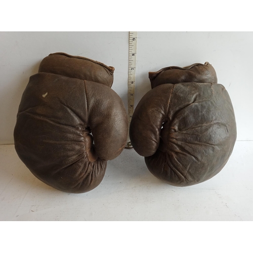 202 - Pair of Antique Straw Filled Boxing Gloves