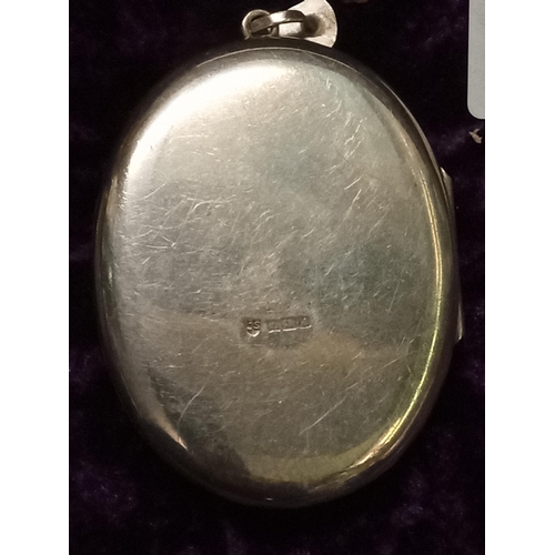 27 - Very Large Nicely Decorated Silver Locket