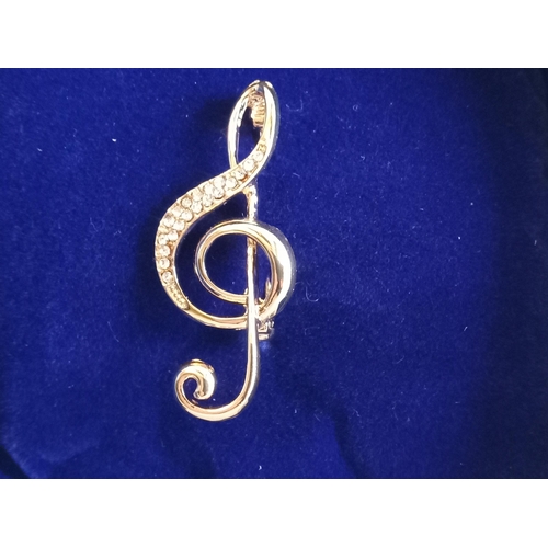 293 - Yellow Metal Musical Note Brooch in Fitted Box