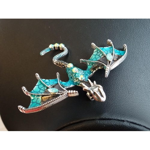 299 - Ornate White Metal Dragon Brooch