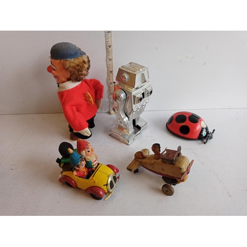 77 - 4 Assorted Clockwork Toys Inc Tin Plate