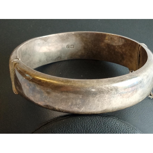 130 - Highly Decorated Silver Hinged Bangle,25.55 grams