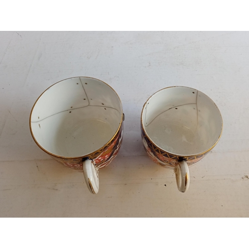 67 - 2 Early Royal Crown Derby Cups with Early Staple Repairs