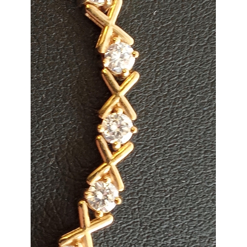 36 - 9ct Gold Bracelet with Clear Stones