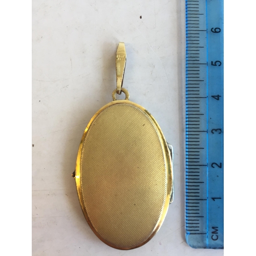 131 - Yellow Metal Locket