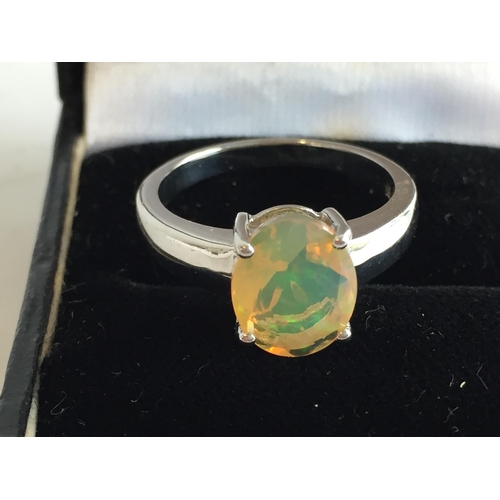 304 - Silver Ring with Yellow Stone, size R1/2