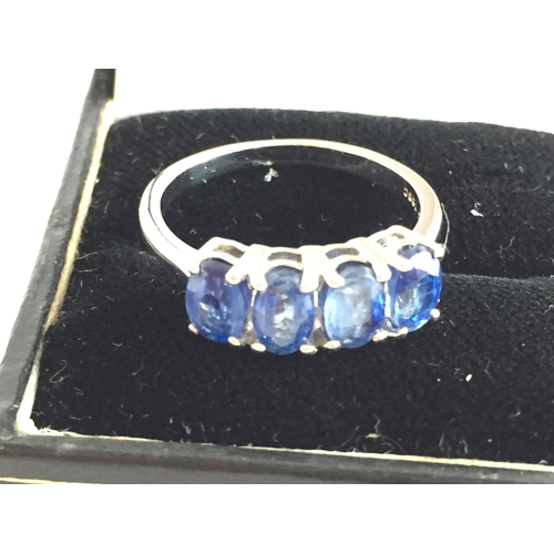 306 - Silver Ring with Blue Stones. size P1/2