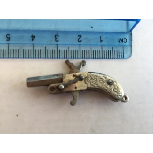 132 - Very Rare Pocket Watch Key Shaped as a Flintlock Pistol. Working Order