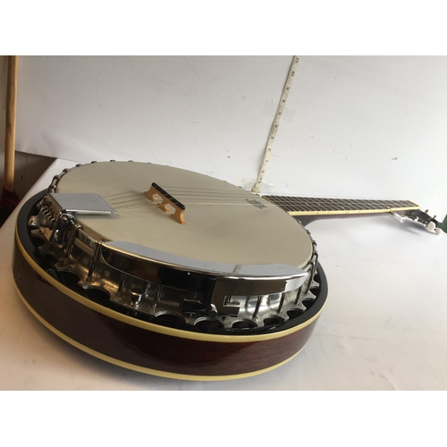 285 - A Tonewood  Left Handed  5 String Banjo with Carry Case. Lovely Condition.
 Shipping Unavailable