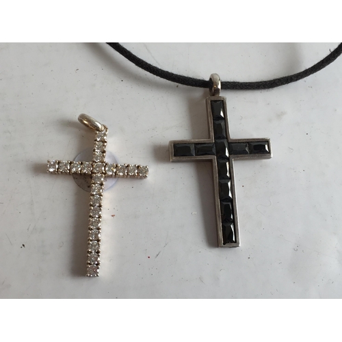 197 - 2 Solid Silver Crosses