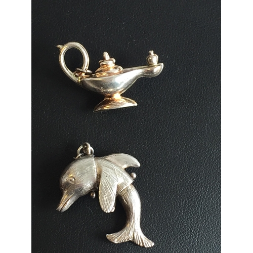 310 - Articulated Silver Dolphin & Silver Genie Lamp Charms