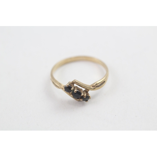 15 - 9ct gold sapphire trilogy ring