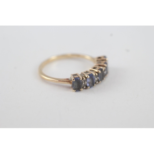21 - 9ct gold blue & white gemstone dress ring