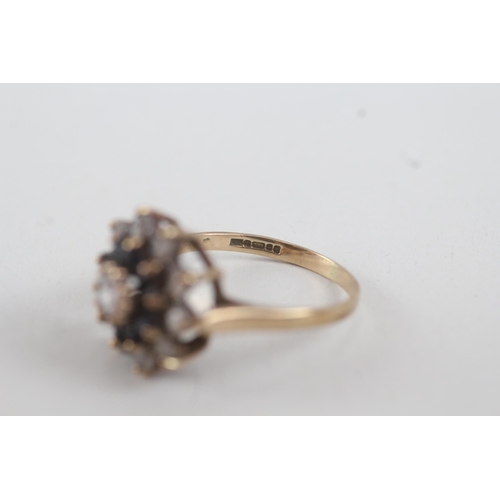 33 - 9ct gold sapphire & cubic zirconia floral cluster ring