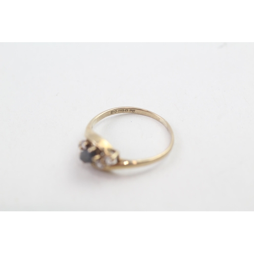 6 - 9ct gold sapphire & white gemstone dress ring