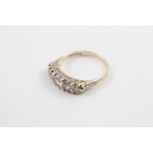 8 - 9ct gold 5 stone white gemstone ring