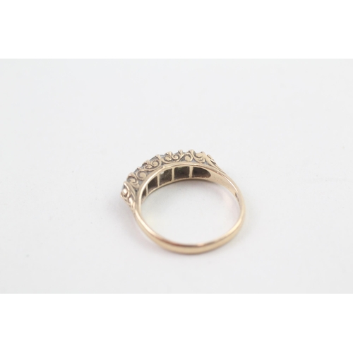 8 - 9ct gold 5 stone white gemstone ring