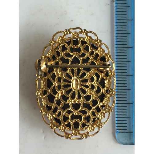 98 - Irridescent Cameo Broach Yellow Metal