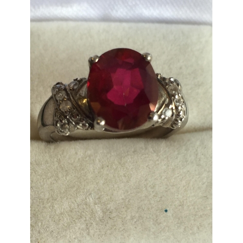 48 - Sterling Silver Faceted Garnet Ring, size R 1/2