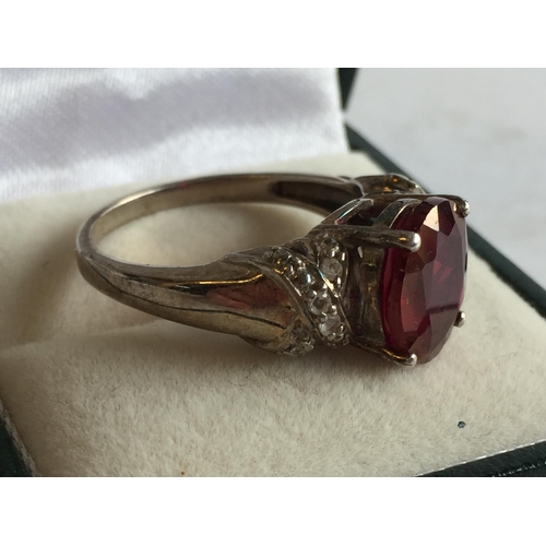 48 - Sterling Silver Faceted Garnet Ring, size R 1/2