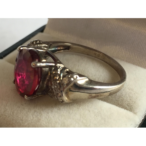 48 - Sterling Silver Faceted Garnet Ring, size R 1/2