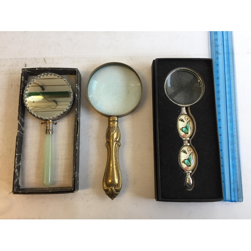 277 - Three ornate Magnifying Glasses