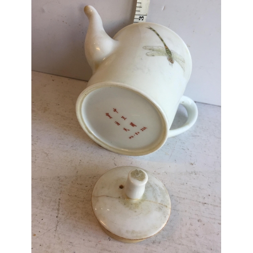 9 - Signed Chinese Teapot with Dragonfly Decoration.
 Airline crack to lid