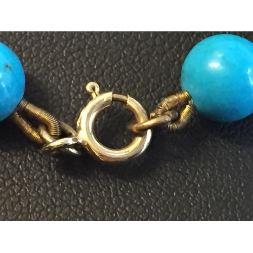 254 - String of Genuine Turquoise Beads with 9ct Gold Clasp. 33.76 grams